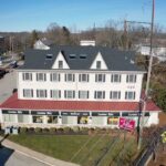 New GAF Timberline HDZ Charcoal shingle roof and VELUX skylights on commercial property in Fort Washington PA by Nealman Construction