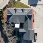 New GAF Timberline HDZ Charcoal shingle roof and VELUX skylights on commercial property in Fort Washington PA by Nealman Construction