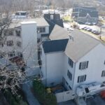 New GAF Timberline HDZ Charcoal shingle roof and VELUX skylights on commercial property in Fort Washington PA by Nealman Construction
