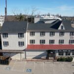 New GAF Timberline HDZ Charcoal shingle roof and VELUX skylights on commercial property in Fort Washington PA by Nealman Construction